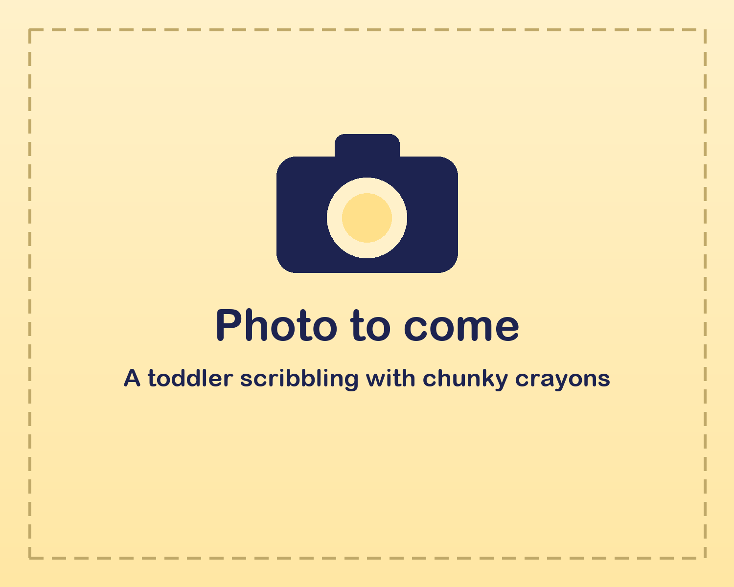A toddler scribbling with chunky crayons